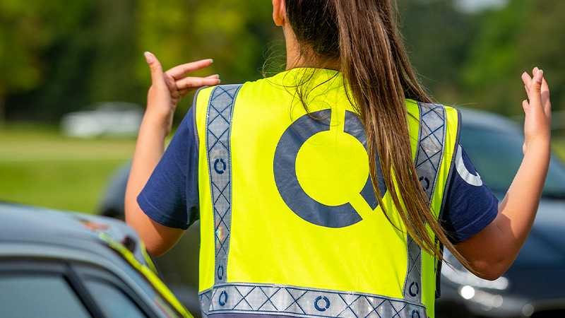 A Tracsis Events Marshal directing traffic