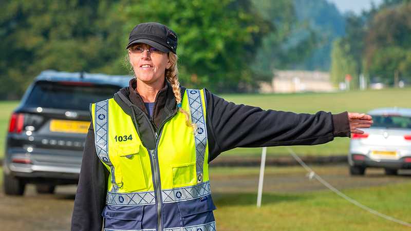 A Tracsis Events Marshal directing traffic