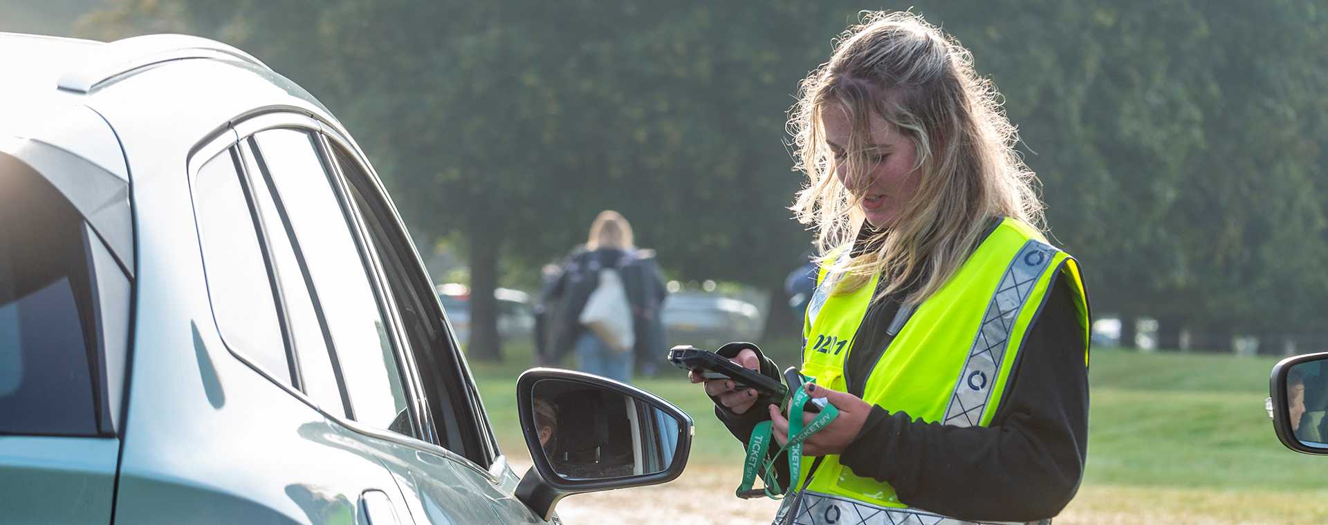 A Tracsis Events Steward assisting a motorist