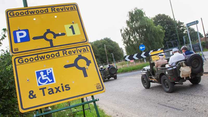 Yellow traffic signs at Goodwood Revival