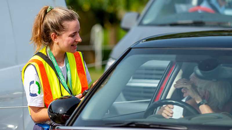 A Tracsis Events Marshal assisting a motorist